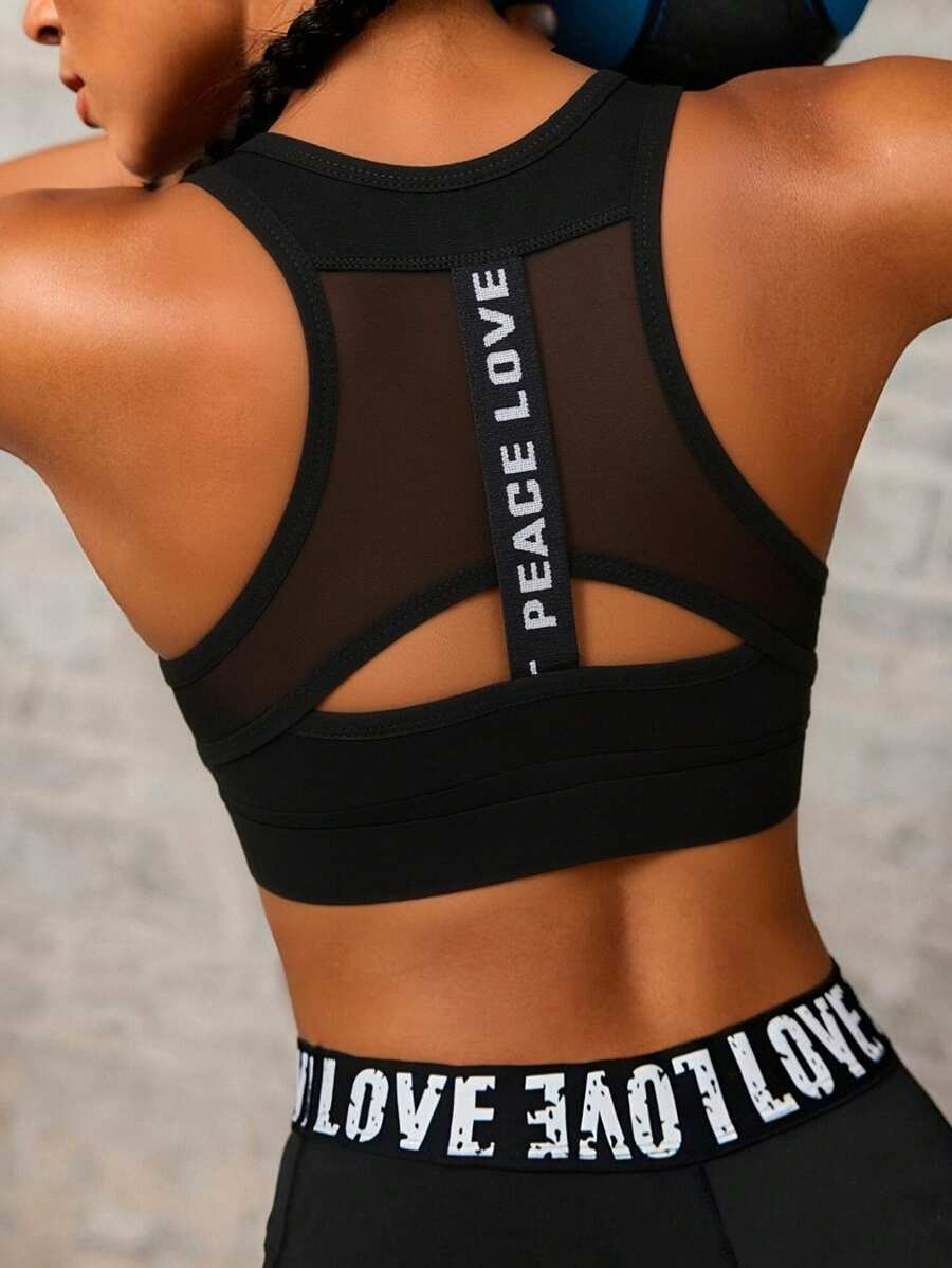 Sujetador deportivo sin costuras de alta intensidad con empalme de malla, alta elasticidad, absorción de impactos, sujetador de yoga transpirable con tirantes ajustables - Negro - Ver 1