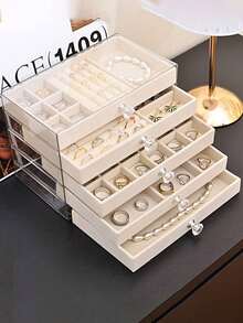 Hộp đựng trang sức cao cấp 5 tầng, dung tích lớn này được làm từ acrylic trong suốt. Nó là hộp trưng bày trang sức kiểu ngăn kéo, phụ kiện lưu trữ trang sức và hộp sắp xếp trang sức. Hộp đi kèm với khay nhung có thể điều chỉnh và phù hợp để đựng bông tai, nhẫn, vòng tay, dây chuyền, v.v. Đây là món quà ngày lễ, quà tặng cho phụ nữ và quà Giáng sinh. - Hộp đựng trang sức cao cấp - Xem 5