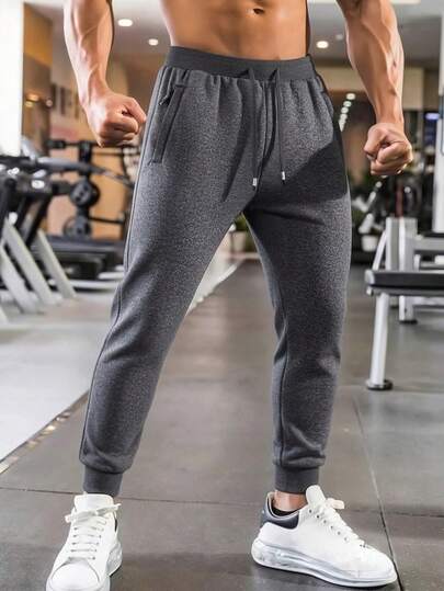 Quần nỉ thể thao nam dáng rộng, thường ngày, thích hợp cho hoạt động ngoài trời.