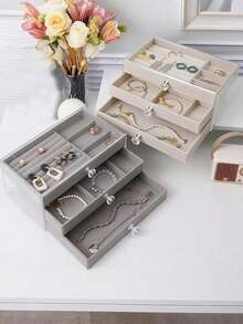 Hộp đựng trang sức cao cấp 5 tầng, dung tích lớn này được làm từ acrylic trong suốt. Nó là hộp trưng bày trang sức kiểu ngăn kéo, phụ kiện lưu trữ trang sức và hộp sắp xếp trang sức. Hộp đi kèm với khay nhung có thể điều chỉnh và phù hợp để đựng bông tai, nhẫn, vòng tay, dây chuyền, v.v. Đây là món quà ngày lễ, quà tặng cho phụ nữ và quà Giáng sinh. - Hộp đựng trang sức cao cấp - Xem 6