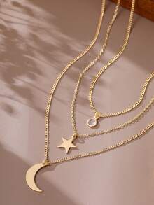 三件套简约叠戴项链，包括铜质星星、月亮、圆形边框和锆石，适合女性日常佩戴和派对场合。 - 金黃色 - 查看 7