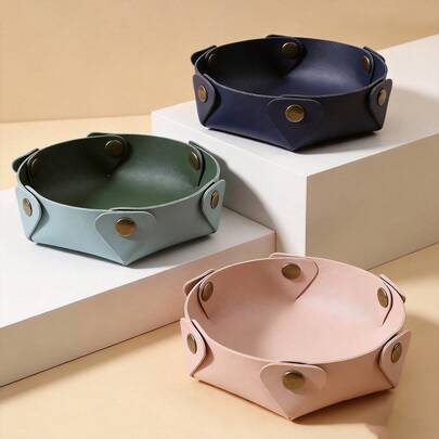 1个【仿皮可拆卸储物盆】，颜色可选黑色/棕色/酒红色/黄色/橙色。时尚简约的圆形储物盒，防水耐磨，轻巧且质感奢华。可用作玄关钥匙托盘、客厅茶几收纳盒、梳妆台化妆品收纳盒、酒店桌面收纳托盘、家用卧室、更衣室、衣柜及其他杂物收纳盒。