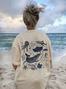 新款夏季女式简约纯色海洋动物印花圆领米色短袖T恤，鲨鱼、海豚、水母、海龟、海星图案，时尚百搭，适合女性日常穿着、度假休闲、春假等场合。 - 杏色 - 查看 1