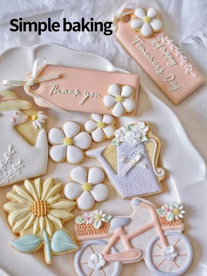 Un set di formine per biscotti che rendono omaggio ai giardinieri, timbri per biscotti con motivi di biciclette, girasoli e docce, uno stampo per biscotti come regalo per gli insegnanti durante le vacanze e strumenti per preparare dolcetti per gli insegnanti