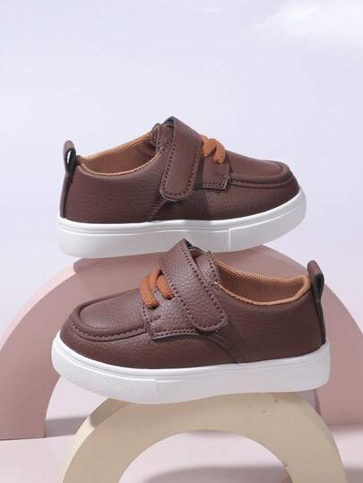 1双男女童轻便休闲户外运动鞋，纯色百搭时尚简约白色鞋款，适合春秋季穿着