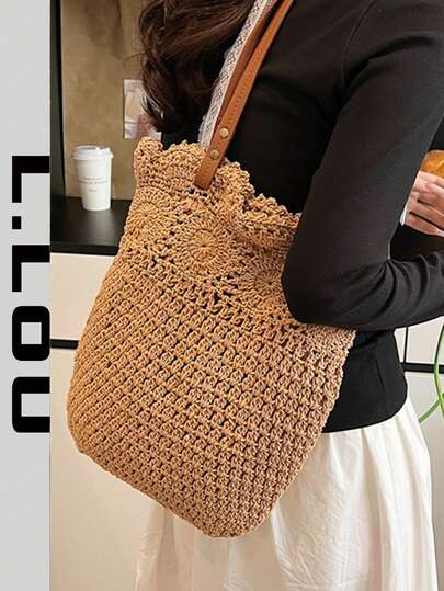 Bolsa de palha para férias de praia de verão 2026, design vazado, bolsa de ombro de grande capacidade para mulheres.