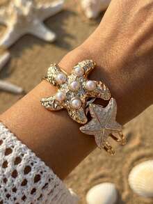 Pulsera con forma irregular de estrella de mar con aspecto nacarado - Accesorio de mano de estilo bohemio y vacacional para la playa para mujeres - Pulsera de estrella de mar - Ver 3