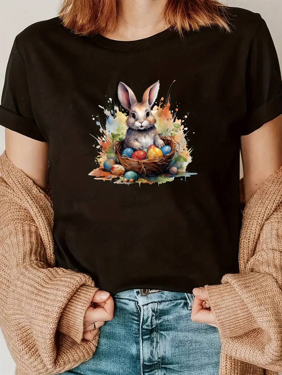 Camiseta Gráfica De Conejo De Pascua Para Mujer - Manga Corta, Cuello Redondo, Top Casual De Primavera/verano Con Diseño De Huevo Vibrante, Mezcla De Poliéster Blanco, Ligero Y Transpirable Para Ropa Casual, Top De Primavera/verano | Estampado Gráfico Juguetón | Mezcla De Poliéster - Oscuro - Ver 1