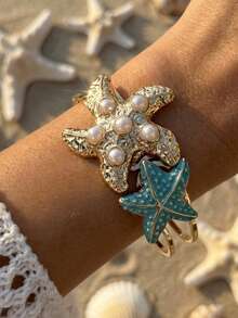 Pulsera con forma irregular de estrella de mar con aspecto nacarado - Accesorio de mano de estilo bohemio y vacacional para la playa para mujeres - Pulsera de estrella de mar - Ver 4