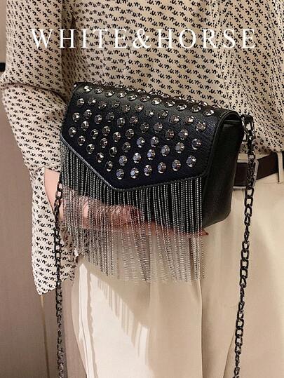 迷你鉚釘和流蘇裝飾翻蓋方包