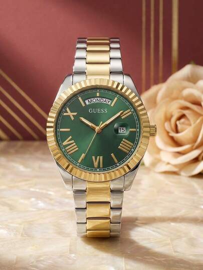 Guess Đồng hồ đeo tay nữ cổ điển hai tông màu bằng thép không gỉ, mặt số màu xanh ngọc lục bảo, chữ số La Mã, hiển thị ngày và thứ, kiểu dáng thanh lịch, sang trọng, thích hợp đeo hàng ngày ở văn phòng hoặc làm quà tặng kỷ niệm.