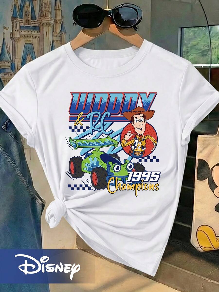 Disney Toy Story Woody And RC Racer 1995 Champion Themed Short-Sleeve T-Shirt. Features Woody's Cowboy Design And RC Racer Green Remote-Controlled Car Cartoon Print. Versatile And Stylish Round-Neck Short-Sleeve Tee For Family Outings - White - View 1