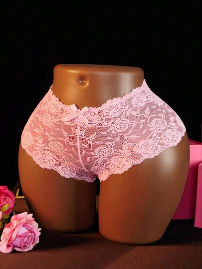 Nya sexiga spets halvtransparenta damtrosor, rosettdekoration med hög midja och asymmetrisk spetsdesign, bekväma sexiga underkläder
