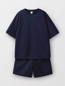 Bộ áo thun và quần short in chữ hoạt hình dành cho bé trai tuổi teen. - Xanh đậm - Xem 3
