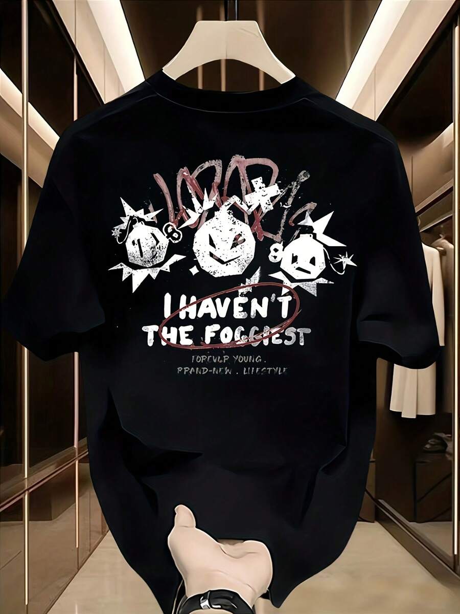 Camiseta de hombre para el verano, cuello redondo y manga corta, ideal para uso diario, citas, ocio y deporte.Imprescindible de moda Camiseta de manga corta negro con patrón de dibujos animados y texto - Negro - Ver 1