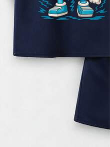 Bộ đồ thường ngày gồm áo phông in chữ và quần short cho bé trai tuổi teen. - Xanh đậm - Xem 7