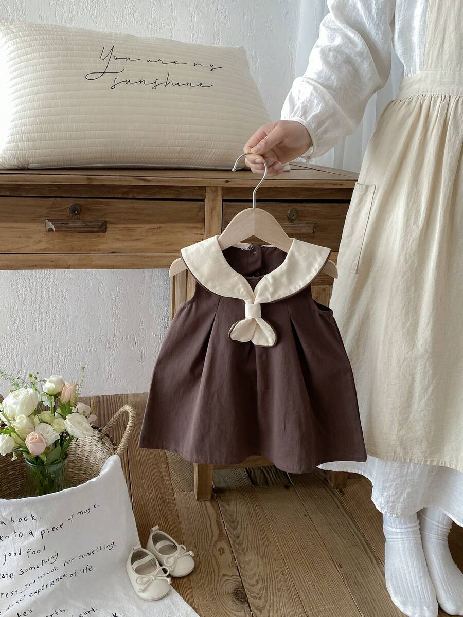 1 Stück Baby Mädchen Retro Prinzessin ärmelloses Kleid mit Rüschenkragen & Schleifen Dekor, geeignet für die Schulanfang Saison