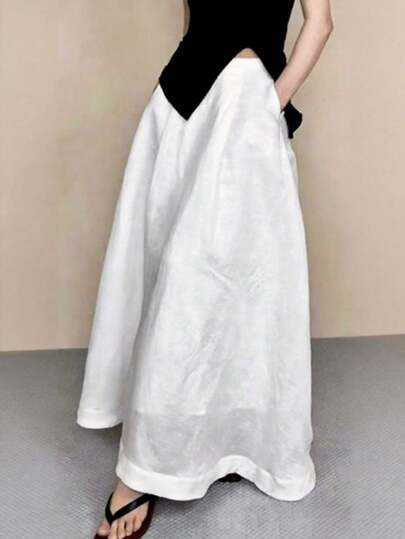 白色半身裙，优雅休闲的春夏街头风，兼具青春活力与成熟韵味，高品质复古度假装