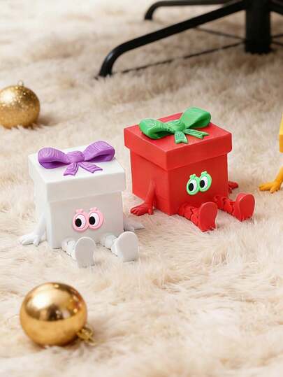 1个蝴蝶结礼盒装饰品，带眼部装饰贴片，3D打印，造型奇特，趣味十足。这款礼盒既可作装饰品，也可作浪漫的桌面摆件，色彩缤纷又可爱，是节日、生日、创意派对、母亲节礼物、复活节礼物以及趣味家居装饰的理想之选。此外，它也是节日、生日、创意派对、母亲节礼物、复活节礼物和趣味家居装饰的完美选择。这款礼盒还可作趣味礼物和周年纪念礼物。