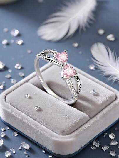 1個 オリジナル 925スターリングシルバー リング レディース ピンク色 高品質 キュービックジルコニア インレー リボン型 中空 LOVEパターン エレガントジュエリー ギフト 日常 パーティー ショッピング フェスティバル バンケット パーティー ウェア適用