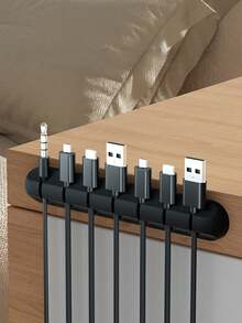 1 cái dụng cụ sắp xếp dây cáp, giá đỡ quản lý dây cáp để bàn, dụng cụ giữ gọn dây tai nghe. - Xem 3