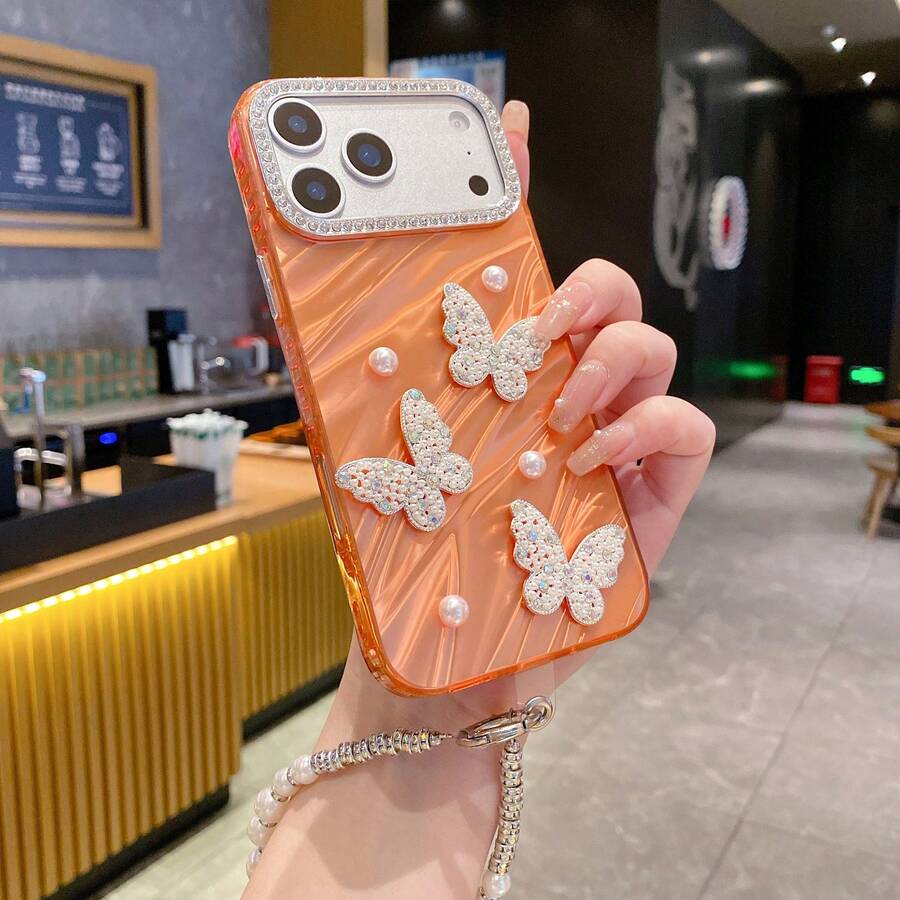1个橙色3D珍珠蝴蝶结手机壳，适用于，带腕带的保护套，时尚美观