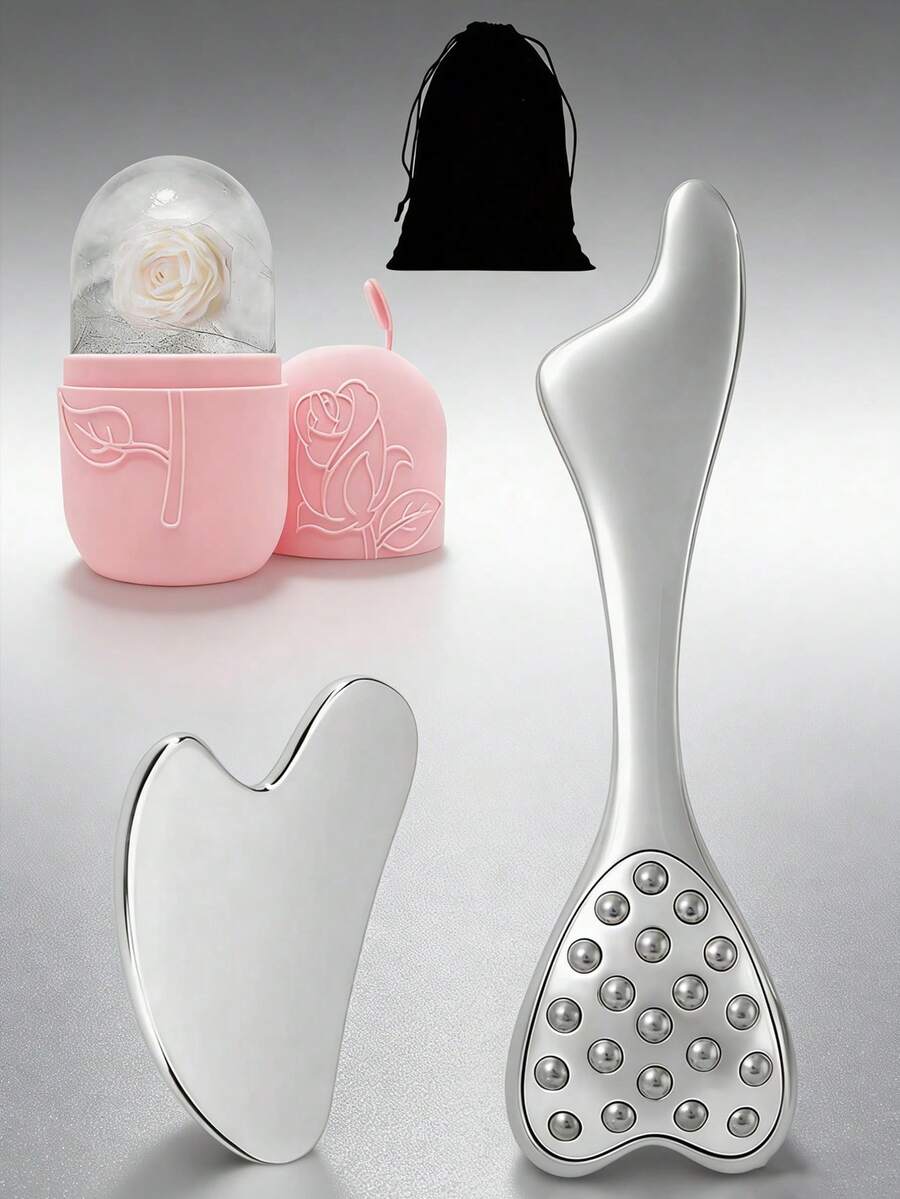 四件套面部护理套装包括：硅胶面膜冰格、大号不锈钢刮痧板、面部按摩滚轮、黑色礼品袋。可重复使用的家用按摩SPA套装，送给家人和女朋友的绝佳礼物。 - 彩色 - 查看 1