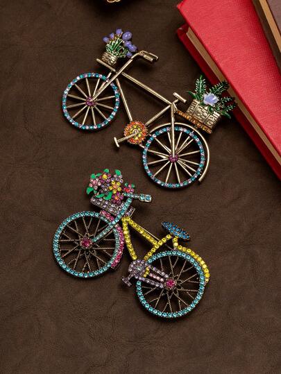 Broche de vélo floral coloré et unique de style vintage Un projecteur rétro frais pour les fêtes. Fabriquée en alliage de cuivre vieilli, le design 3D du vélo avec des lignes dynamiques dégage une ambiance artistique rétro, parfaite pour les événements formels, les fêtes rétro et le port quotidien pour devenir naturellement le centre d'attention.