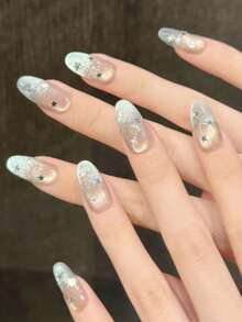 1包/10片蓝色美甲贴片，流星雨 - 午夜星空：手工制作的中长款按压式美甲贴片，冰蓝色猫眼法式设计，点缀星云晕染、流星和月光闪粉 - 酷炫奢华的星座系列 - 淺藍色 - 查看 2