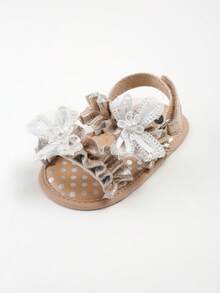 新生儿女童夏季凉鞋，花朵蝴蝶结软底婚纱平底鞋，婴儿学步鞋 - 金色 - 查看 2