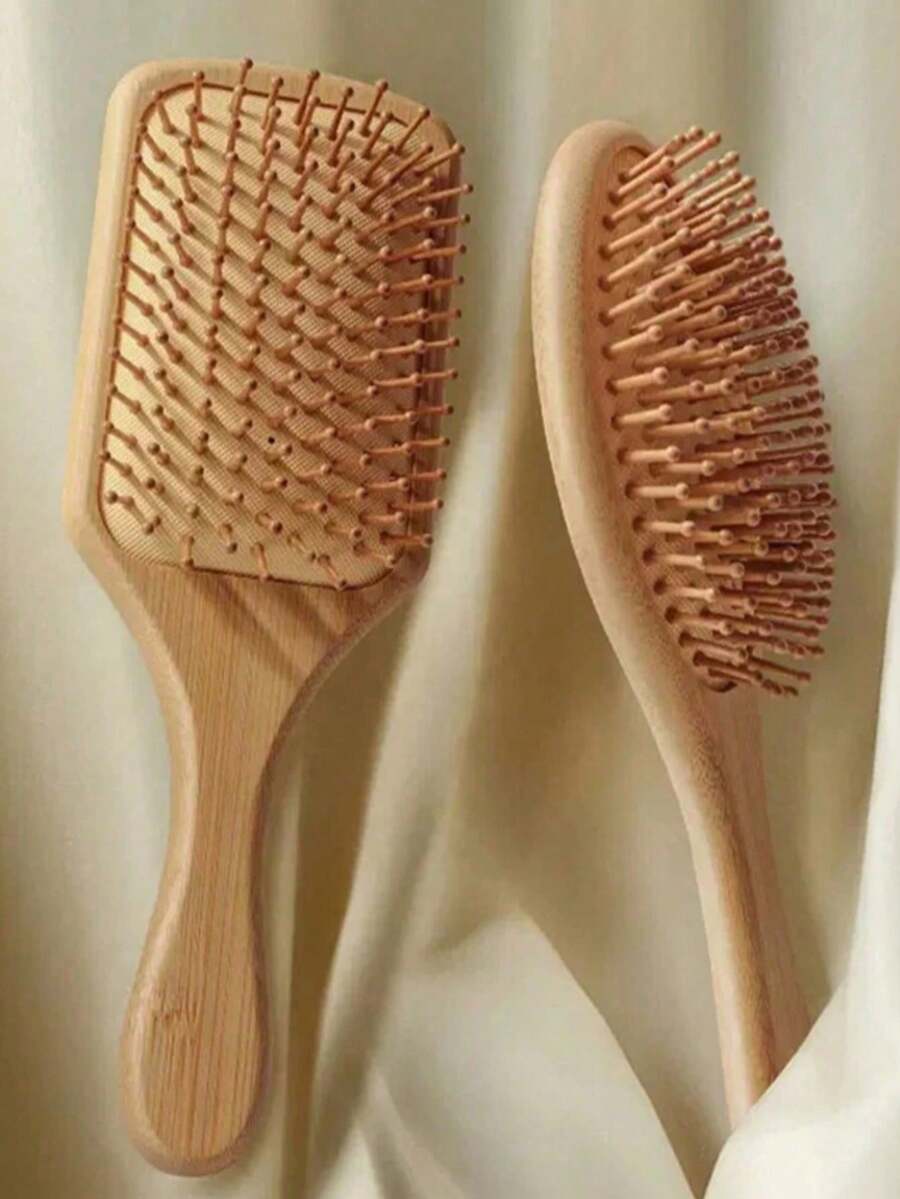 1支黄色特大号天然竹制气垫发梳，带手柄，防静电，易于梳理，可按摩头皮，男女通用，适合所有发质，包括卷发、浓密发和细软发。是返校、旅行、居家日常使用的理想美发造型工具，也是美发护理配件和美发工具套装的一部分。 - 彩色 - 查看 1