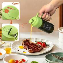 1/2 chai xịt dầu ô liu 2 trong 1, dung tích 470ml, có vòi phun sương mịn, bình xịt dầu bằng thủy tinh màu, thích hợp cho nấu ăn, nồi chiên không dầu, trộn salad, nướng. - Xem 4