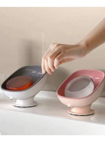 1个吸盘式皂盒：双层设计，方便整齐收纳肥皂，快速沥水，适用于家庭、浴室；不积水的沥水皂盒