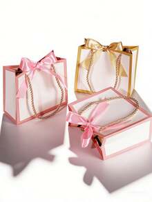 Set de 10 bolsas de regalo pequeñas con asas, bolsas mini blancas, tamaño 14x6.5x12 cm, bolsas de regalo pequeñas al por mayor con cintas, adecuadas para recuerdos de fiestas, Día de la Madre, recuerdos, bodas, baby showers (blanco y rosa) - Bordes rosas + cinta de abanico - Ver 8