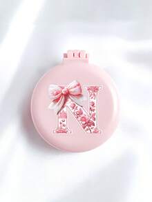 便携式粉色蝴蝶结字母图案圆形梳子，带镜子，A-Z字母迷你垫梳，二合一可折叠梳子，小巧时尚的旅行美容工具，适合旅行、露营、办公、出差、演出等场合，可作为手提包必备单品或生日礼物，方便携带，非常适合户外活动和返校使用。 - 彩色 - 查看 12