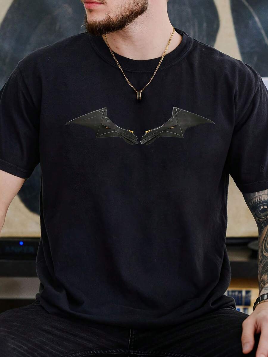 Warner Bros Camiseta con el logotipo de Batman para hombre: una camiseta con temática de Batman con un logotipo de murciélago y un diseño de murciélago, cuello redondo, mangas cortas, estilo casual, adecuada para verano y primavera. - Negro - Ver 1