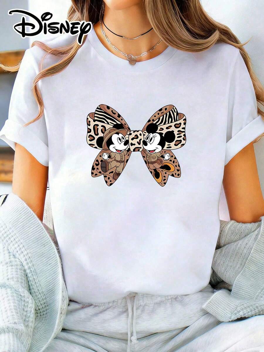 The Disney-Inspired Mickey & Minnie Animal Print Bow T-Shirt For Women Is A Casual, Round-Neck, Short-Sleeved Top Perfect For Photos At Disneyland, A Travel Souvenir, Everyday Wear, Or Matching Family Outfits. It Also Makes An Ideal Valentine's Day Gift For Friends And Family. This Women's Clothing Is A New Spring Style, Comfortable And Skin-Friendly, Suitable For Outdoor Wear. - White - View 1