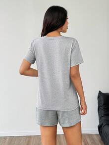 Set de 2 piezas con parte superior de manga corta y pantalones cortos con estampado retro de Los Ángeles, Estados Unidos, de corte holgado. Conjunto deportivo casual y elegante para el gimnasio y actividades al aire libre - Gris Claro - Ver 4