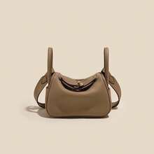 New Women's Handbag Made Of Genuine Leather With A High-End Feel, Crafted From Top-Layer Cowhide, Suitable Both Hand-Carrying And Shoulder-Carrying.It's A Niche, Large-Capacity, Simple And Stylish Bag Commuting, Offering A Of Light Luxury And Sophistication Women - 亞麻藍[金扣] - 查看 8