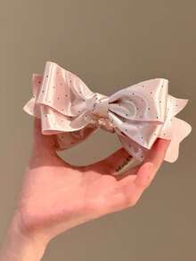 1个缎面波点蝴蝶结香蕉发夹，设计优雅，用途广泛，可扎高马尾，呵护秀发。 - 彩色 - 查看 10