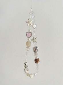 极简白色蝴蝶结手机壳挂绳吊坠，短款便捷挂绳，适用于所有手机和相机，可斜挎、手持或戴在手腕上，防丢防摔，是送给母亲、家人和朋友的理想生日、节日礼物，也是手机挂饰和手机挂绳的绝佳选择。 - 彩色 - 查看 4