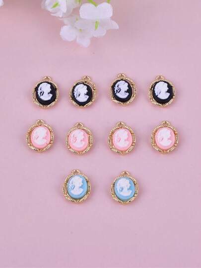 10 piezas Colgante ovalado DIY de figura de metal y resina