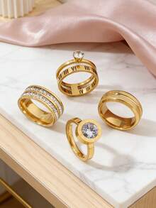 4枚时尚精致的不锈钢戒指，18K镀金镶嵌钻石，包括圆形、方形和不对称珍珠戒指，夸张几何造型黄金戒指套装。适合女性日常佩戴、约会、娱乐、婚礼、订婚、节日等场合，可作为礼物赠送，也可作为珠宝收藏。 - 4件 - 查看 3