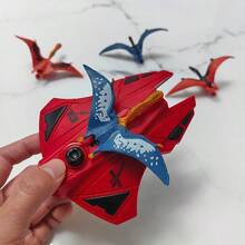 Lanzador de dinosaurio, juguete para niños de 3+ años - Lanzador manual de dinosaurio volador, diversión al aire libre y regalo perfecto para cumpleaños/Navidad - Rojo - Ver 8