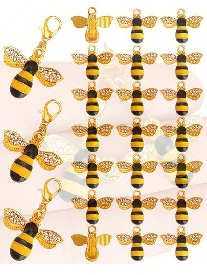 100件套闪亮水钻蜜蜂钥匙扣配件，包含30只蜜蜂、35个龙虾扣和35个铁环。适用于手工钥匙扣、时尚蜜蜂主题饰品、汽车挂件、包包挂饰、万圣节装饰。