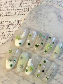 10Pcs Long Almond-Shaped Clear & Green Press-On Nails - Handmade Whimsical & Fresh Style With 3D Angel Wings, Treble Clef Charms, Star Accents, Green Rhinestones & Iridescent Shimmer | Reusable & Removable False Nails, Perfect For Spring, Festivals & Daily Wear | Ready To Wear In 2 Mins, No Nail Polish Needed | Includes 1pc Jelly Glue & 1 Mini Nail File - Follow Your Heart - View 3