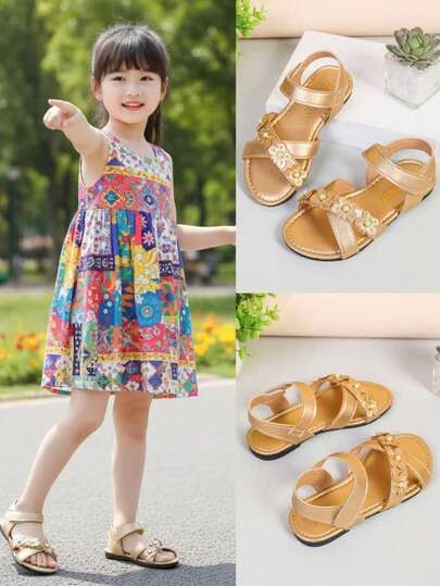 1双加大码金色女童平底时尚凉鞋，PU材质交叉绑带，闪亮珍珠装饰，魔术贴搭扣，露趾设计，适合3-15岁女孩，日常、派对、旅行、海滩等场合，2026夏季款