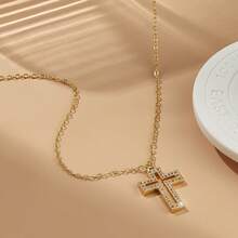 这款奢华时尚的心形项链采用铜合金材质，搭配锆石吊坠，适合日常通勤和节日场合佩戴。 - 十字架吊墜 - 查看 1