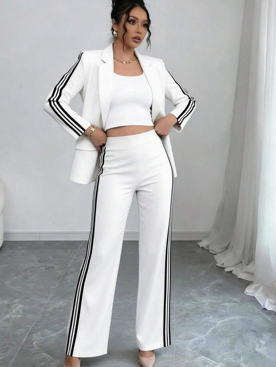 Elegante conjunto de pantalón largo para mujer con detalles de nudo y botones, diseño de rayas laterales y mangas estilo obispo. - Blanco - Ver 1