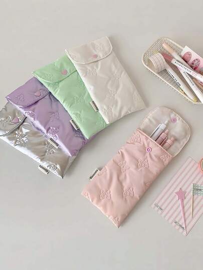 1个压花蝴蝶结铅笔盒，高品质文具收纳袋，铅笔袋，便携式太阳镜盒，韩版纯色蝴蝶笔袋，女生小型化妆品收纳袋